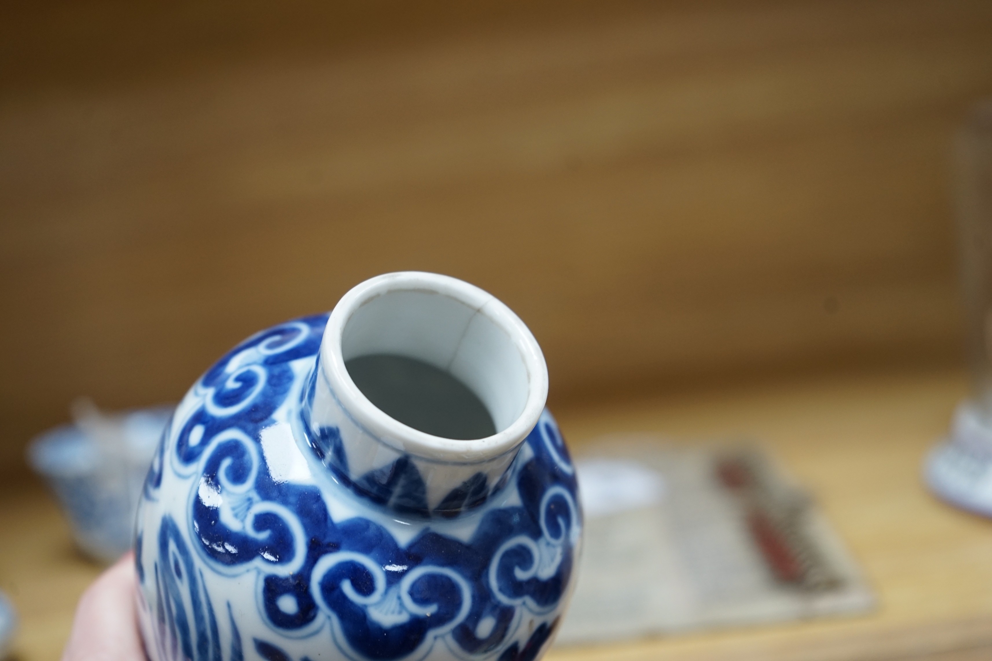 A Chinese blue and white phoenix decorated vase, a pair of circular boxes and a pair of damaged tea bowls. Late 19th century Tallest 17.5cm